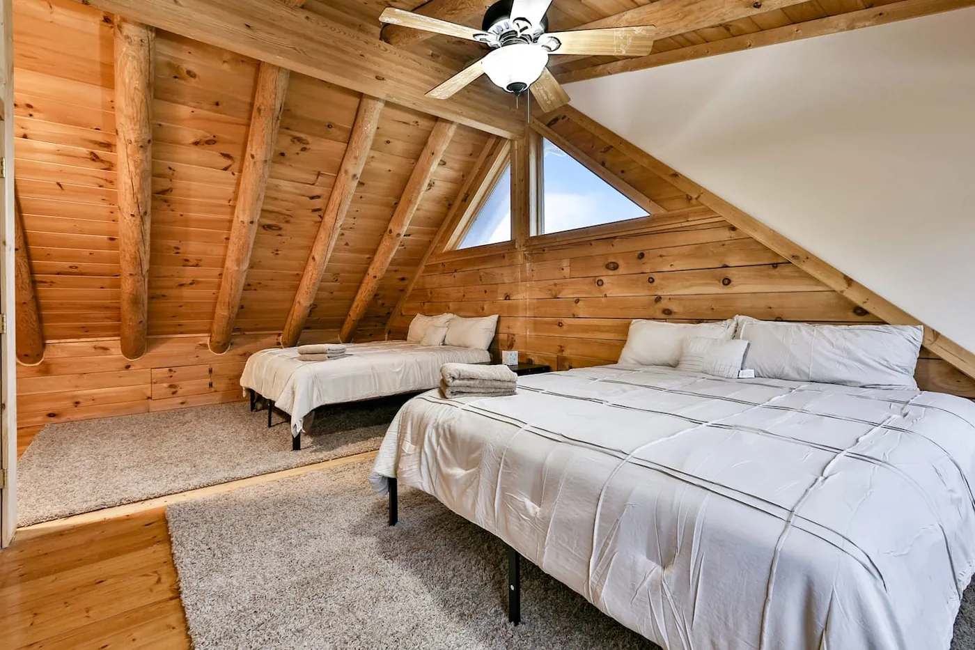 Second attic-style room with exposed beams