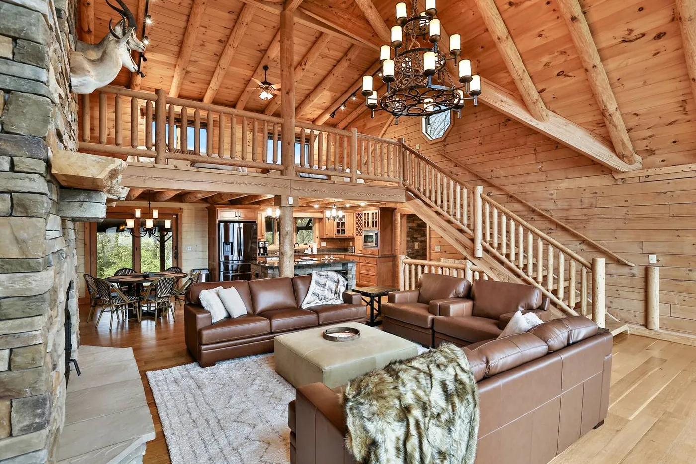 Great room with log staircase