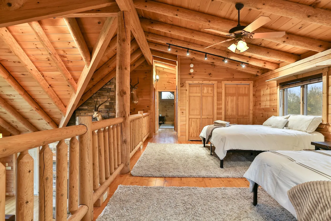 Loft sleeping area overlooking the great room